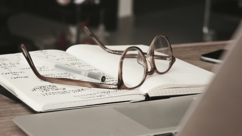 spectacles and paperwork INNW